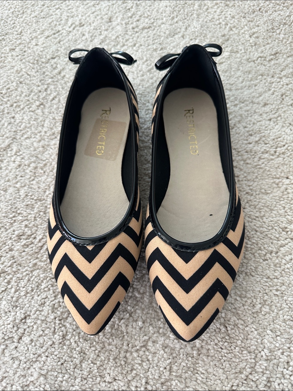 Restricted Women's Tan and Black Chevron Pointed Flats with Bow